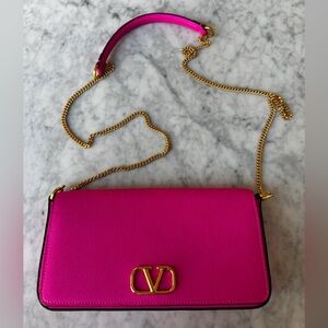 Pink Valentino Garavani VLOGO leather crossbody purse